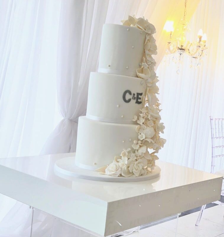White and Clear Cake Table